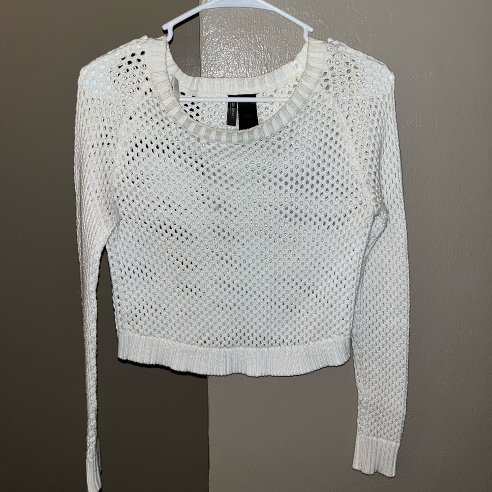Holey white sweater